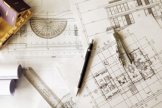 image-engineering-objects-workplace-top-view-construction-concept-engineering-tools-vintage-tone-retro-filter-effect-soft-focus-selective-focus_1418-469